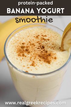 banana yogurt smoothie in a glass with cinnamon on top