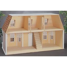 a paper model of a house with stairs and windows