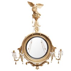 an antique clock with angel on top and chandelier around it's edges