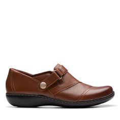 PRICES MAY VARY. Low soles and the slip on feature Ultimate Comfort footbed Hook-and-loop strap with brass button detail Textile lining Leather Upper Clarks Women's, Button Detail, Slip Ons, Loafer Shoes, Tan Leather, Moccasins, Flat Shoes Women, Shoes Flats, Leather Upper