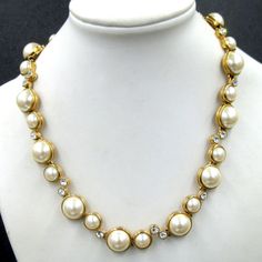 This Stunning Vintage Old Store Stock 1980's Necklace Features Large 12mm And 8mm Glowing Faux Mabe' Pearls Accented With Glittering Rhinestones. The Linked Design Allows This Fabulous Necklace To Lay Fluidly Around The Neck. The Gold Tone Plating Is In Mint Condition. The Fold Over Slap Closes Securely. Still Retains The Original Store Tag With $128 Price Tag. 16 1/4". Rhinestone Collar, The Fold, Price Tag, Collar Necklace, Fold Over, Mint Condition, Womens Jewelry Necklace, Faux Pearl, Size 16