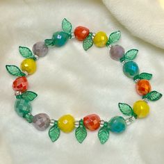 Colorful Glass Beads. Stretch Bracelet. Made By Me. Unstretched Bracelet Is 6.75 Fruit Bracelet, Faceted Glass, Stretch Bracelet, Stretch Bracelets, Womens Jewelry Bracelets, Colored Glass, Green Yellow, Cute Things, Made By Me