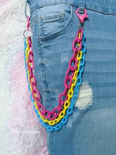 Rainbow Layered Pants Chain, Cute Wallet Chain, Rainbow Pride Color Plastic Chains, Kawaii Pocket Chains, Pansexual Flag Colors Layered pink, yellow and blue plastic chunky chain accessory. Super cute addition to your favorite outfit! A colorful way to express yourself. Based on the LGBTQIA+ flag colors. If you don't see your colors I would love to make them for you, just message me to start your order. See photos for size comparison with a ruler 📏 *Measurements based on length from clip to clip. The shortest chain is the one used for measuring as it's the best to determine how far it will reach on your body. The hanging layered chains are not measured, but you can see that they each get longer to create the stylish layered look.* I love using these chains as a pants chain or wallet chain Rainbow Belt Chain, Pride Flag Outfit, Pansexual Outfit Ideas, Pride Accessories Diy, Pansexual Jewelry, Pansexual Pride Outfit, Pansexual Outfits, Cute Pride Outfits, Kidcore Accessories