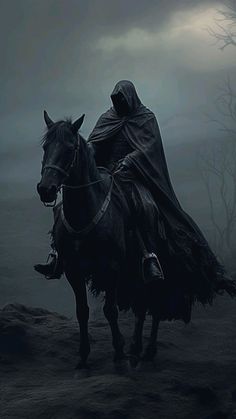 a man riding on the back of a horse in a dark foggy forest at night