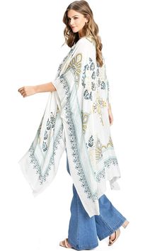 Beautiful boho printed cardigan with an open-front kimono silhouette. Light, sheer fabric is great for layering over casual outfits or as a cover-up. CARE | Hand Wash Cold CONTENTS | 100% Viscose MEASUREMENTS | 46"/117 cm Top to Bottom (Size O/S) MODEL | 5'8 - wearing O/S IMPORTED Bohemian Lightweight Cover-up For Day Out, Bohemian V-neck Cardigan With Floral Print, White V-neck Bohemian Kimono, Casual Long Printed Cover-up, Flowy V-neck Cardigan For The Beach, Casual V-neck Kimono With Boho Print, Printed Wrap Kimono For Beach Cover-up, Bohemian Summer Cover-up For Layering, Bohemian Long Kimono For Layering