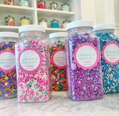 the jars are filled with sprinkles and other colorful things to make it look like they have been put together