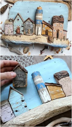 two pictures of wooden houses on a shelf and one is painted in blue, the other has