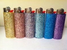 the flasks are lined up in different colors