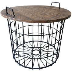 a round table with metal frame and wood top