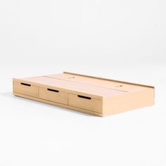 an empty wooden box with three drawers