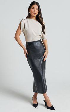 Get ready to turn heads in the Emma Midi Skirt. Crafted from high-quality faux leather, this black pencil skirt is a must-have addition to your wardrobe. With its flattering high-waisted design and versatile midi length, it's perfect for both workwear and nights out on the town. The PU fabric gives it a sleek and polished look that pairs effortlessly with any top or blouse. Step up your style game with the Emma Midi Skirt - because who says you can't be chic and edgy at the same time? Product De Workwear Outfits, Basic Black Dress, Pu Leather Skirt, Neon Outfits, Spring Maxi Dress, Bachelorette Dress, Navy Bridesmaid Dresses, Leather Skirts, Pu Fabric