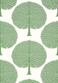 a green and white wallpaper with trees on it