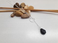 🦋 FREE GIFT BOX WRAPPING (7$ worth). Buy Now! 🦋 Black Lava Stone Y Necklace - Silver Y Necklace, Lava stone Lariat Necklace, Essential Oil Diffuser, Adjustable Chain Lariat, Dainty Jewelry Lava is a stone of protection, strength, and fertility.  For more Handmade Lava stone jewelry, Click Below  https://www.etsy.com/shop/HealingJewelryCrafts?search_query=Lava+stone It is a natural product that is why small differences are possible. Excellent as a birthday gift, anniversary gift, or Christmas gift for your wife, daughter, or just for you to enjoy.  ☑ The necklace comes nicely packed in a box. ☑ Each one of my jewelry is Handmade, and before i deliver it i'm charging it with Healing and positive Energies. ☯ When you'll receive the jewelry, one of the most important components is setting in Lava Stone Jewelry, Silver Y Necklace, Lava Stone, Lariat Necklace, Dainty Jewelry, Oil Diffuser, Essential Oil Diffuser, Stone Jewelry, Silver Necklaces