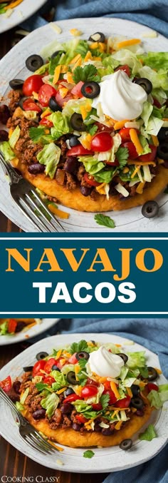 navajo tacos with lettuce, tomatoes, black olives and sour cream