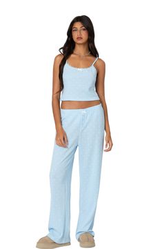 The mood is sure to be relaxed in these waffle-textured knit pants printed with dainty blooms. Elastic waist Faux fly 100% cotton Machine wash, dry flat Imported Wide Leg Waffle Pants, Waffle Loose Pants, Aerie Waffle Pants, Waffle Knit Lounge Set, Aerie Waffle Jogger, Fleece Pants, Textured Knit, Knit Pants, Lounge Pants