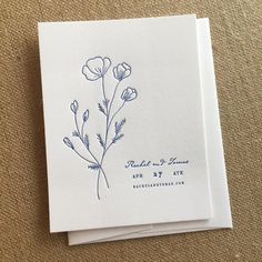 a close up of a card with flowers on it