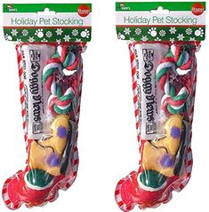 two packages of holiday pet stocking with candy canes