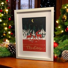 a christmas card sitting on top of a wooden table