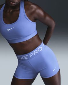 The Nike Pro Shorts are made with stretchy, sleek and supportive fabric that wicks sweat to help you stay dry and comfortable during your workout. This product is made with at least 50% recycled polyester fibers. Shown: Royal Pulse/White Style: CZ9857-495 Volleyball Clothes, Nike Pro Women, Nike Pro Shorts, Volleyball Outfits, Nike Pros, Wicks, White Style, Volleyball, Sleek