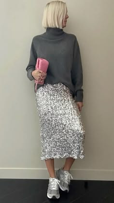 Sequin Skirt Tennis Shoes, Sequin Skirt And Sneakers, Sequin Midi Skirt Outfit Casual, Sequin Skirt Street Style, Sequin Mini Skirt Outfit Casual, Silver Sequin Shorts Outfit, How To Wear Sequin Skirt, Sequin Skirt And Sweater Outfit, Maxi Sequin Skirt Outfit