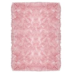 a pink fluffy rug on a white background