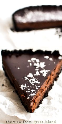 a slice of chocolate pie on top of white paper