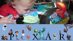 there is a baby eating some cake with monsters on it and the words pixar spelled out