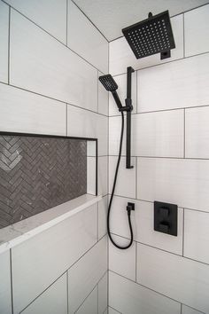 the shower head is mounted to the wall