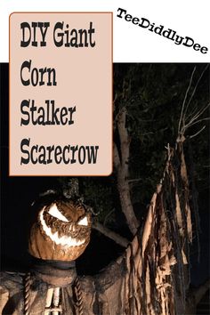 a scarecrow is standing next to a tree with the words diy giant corn staker scarecrow