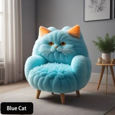 a blue cat shaped chair in a living room