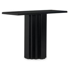 a black table sitting on top of a white floor