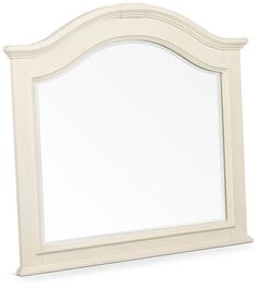 a white mirror sitting on top of a table