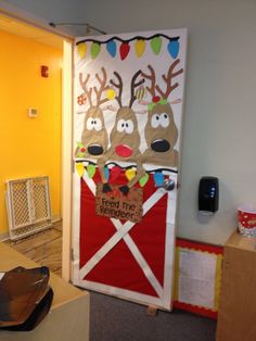 a decorated door with reindeers on it