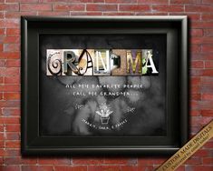 the word grandma written in different languages on a black frame next to a brick wall