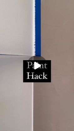 the wall is painted white and has blue tape on it that says, paint hack