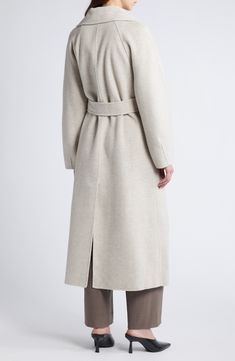 A novel collar style allows this wool-blend coat to provide two cold-weather looks on one hanger. Buttoning the collar all they way up provides neck-warming coziness, while leaving it unbuttoned serves showy shawl-collar style. Front button closure Convertible funnel neck Front welt pockets Removable sash Lined 80% wool, 20% polyamide Dry clean Imported Favorite Daughter, Platform Slippers, Wool Blend Coat, Loungewear Shorts, Designer Clothes For Men, Modern Outfits, A Novel, Fabric Gifts, Funnel Neck