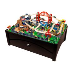 a toy train table with cars and trains on it's sides, including a bridge