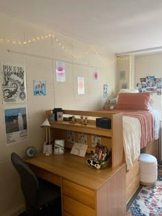 a bedroom with a desk and bed in it