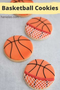 three basketball cookies decorated with royal icing