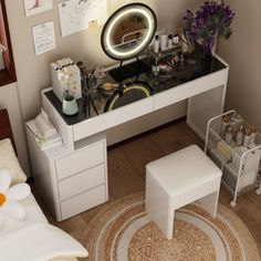 a white desk with a mirror, stool and various items on top of it in a bedroom