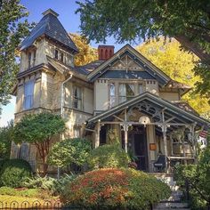 an old victorian house in the fall