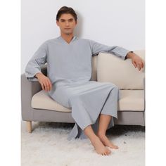 The solid color long-sleeved nightshirts for men are loose fit, allowing you to enjoy your spare time. Pair the v-neck long gown with cozy slippers while lounging around the house or getting ready for bed. The long nightgown has a loose fit that allows you to move freely and has front pockets for storing small items. It is also a good gift for friends and family members. Long Nightgown, Cozy Slippers, Classic Pajamas, Pocket Light, Slippers Cozy, Fabric Tape, Sleep Shirt, Short Pajama Set, Night Shirt