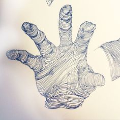 a drawing of a hand with two birds flying over it