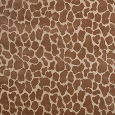 a brown and white animal print rug