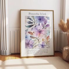 a framed poster with flowers and the words provers 3 8 - 6 on it