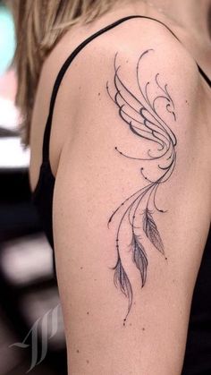 a woman with a tattoo on her arm