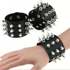 Unisex Black Metal Spike Studded Punk Rock Biker Wide Strap Leather Bracelet Adjustable To 2 Sizes Faux Leather Color: Dark Blue, Black, White, Red Add 2+ Items To A Bundle And Save More! I Ship Fast! Adjustable Punk Bracelets For Biker Events, Trendy Party Bracelets With Rivets, Black Punk Festival Bracelets, Black Gothic Bracelets For Biker Events, Black Punk Bracelets For Festival, Punk Style Studded Bracelets For Festivals, Black Spiked Festival Bracelets, Trendy Black Bracelets With Rivets, Punk Studded Bracelets For Festivals