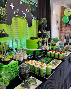 an image of a party table set up with cupcakes and desserts on it