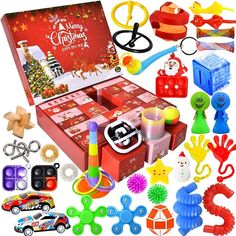 an assortment of christmas toys and accessories in a box