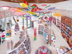 a store filled with lots of balloons and confetti